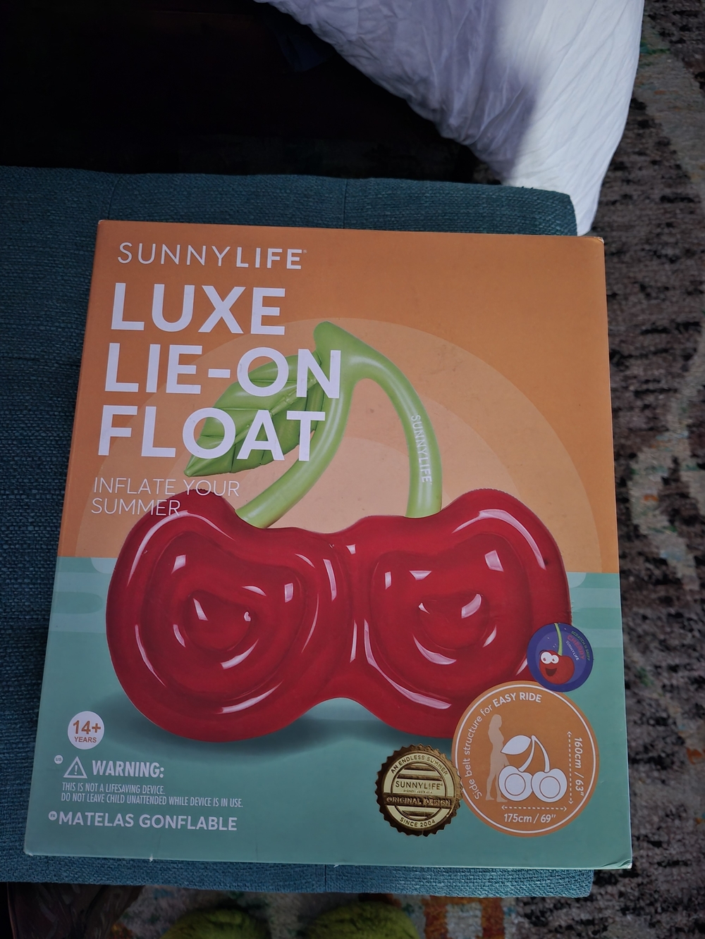 Sunnylife Kids Luxe Cherry Lie-On Float in Red with Green Stem